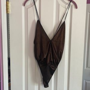 Black and gold bodysuit